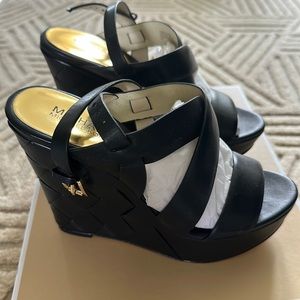 Michael Kors Bennet Wedge. New in box. Size 7M.